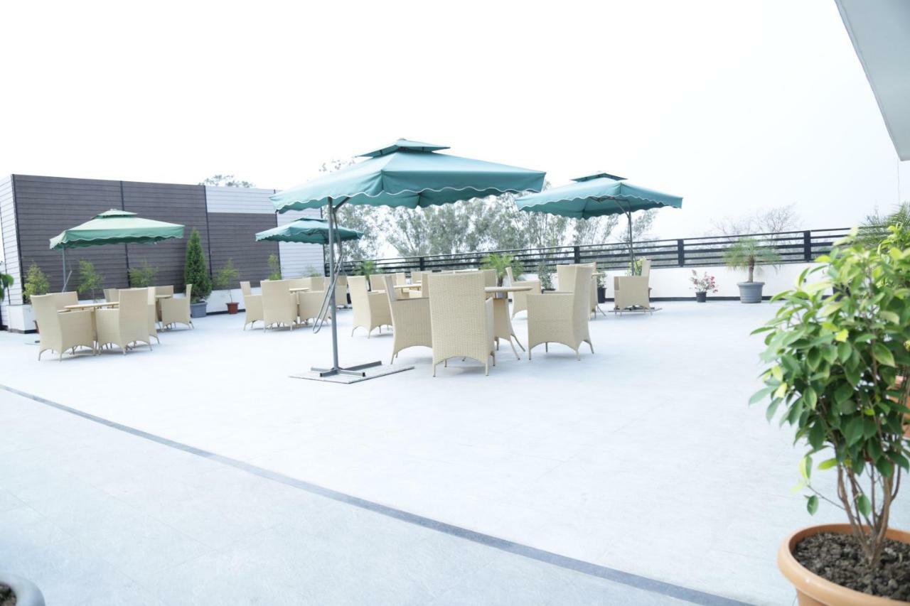 Prism A Boutique Hotel Джорхат Экстерьер фото
