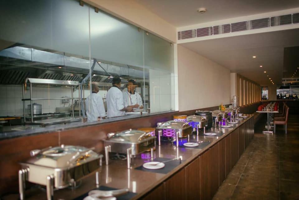 Prism A Boutique Hotel Джорхат Экстерьер фото